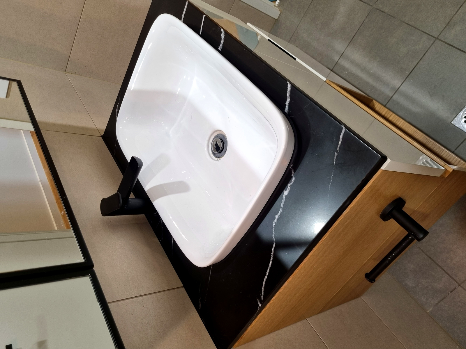 After — black marble vanity polished
