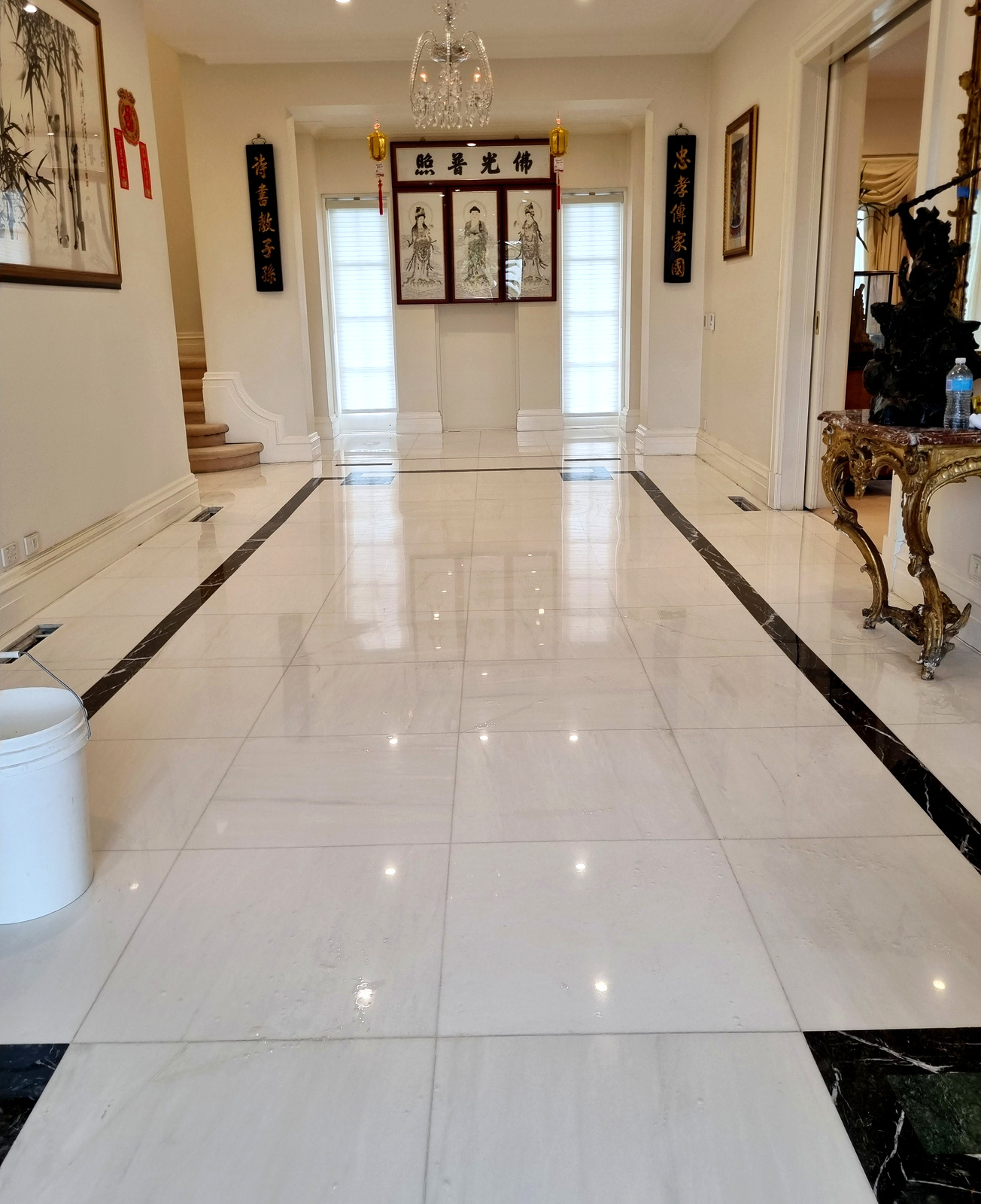 After — white marble hallway polished